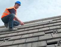 Fitting a rail to attach solar panels to the roof